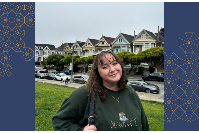 abba smiling infront of SF houses