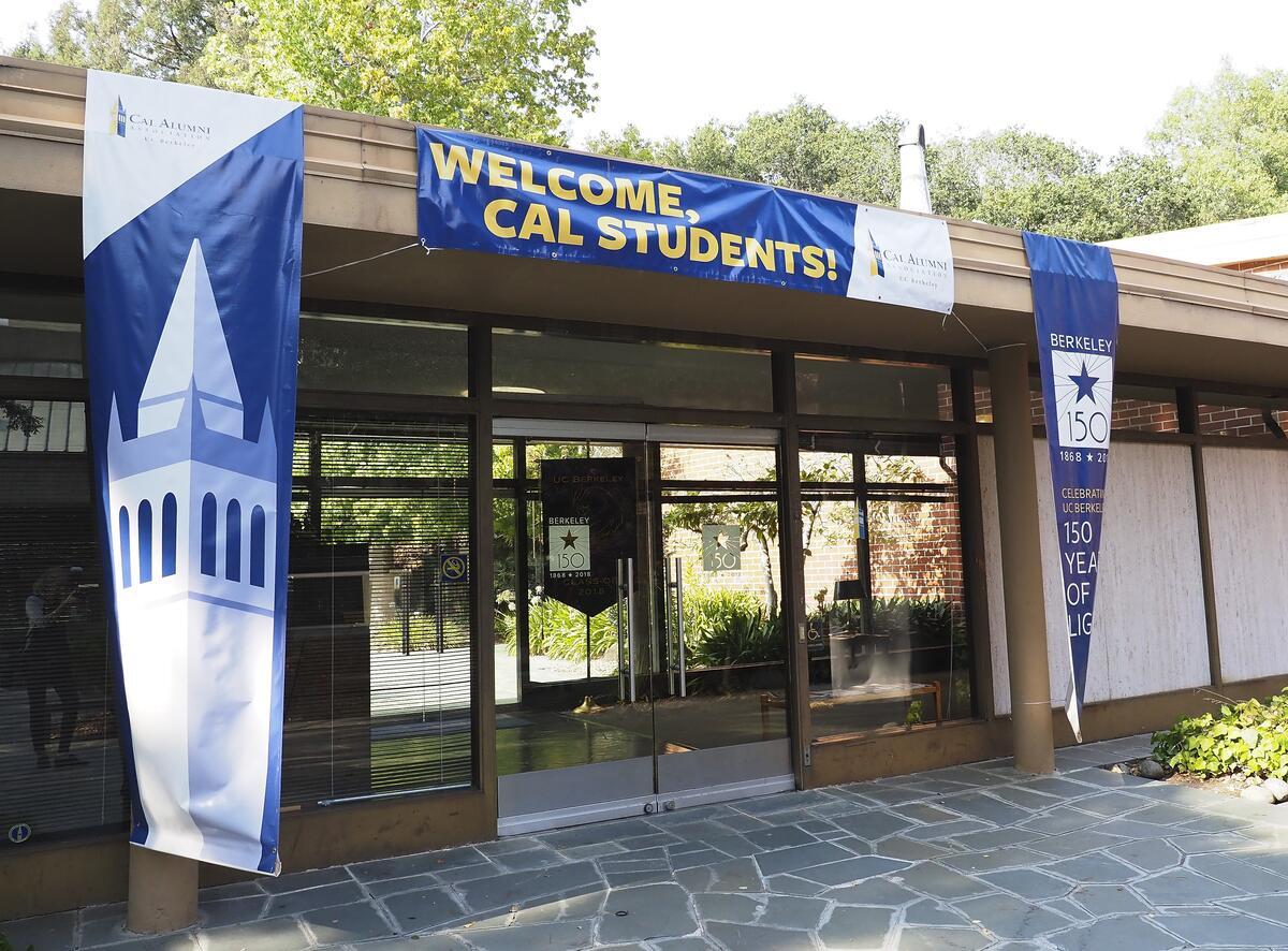 Alumni House with banner reading Welcome Cal Students