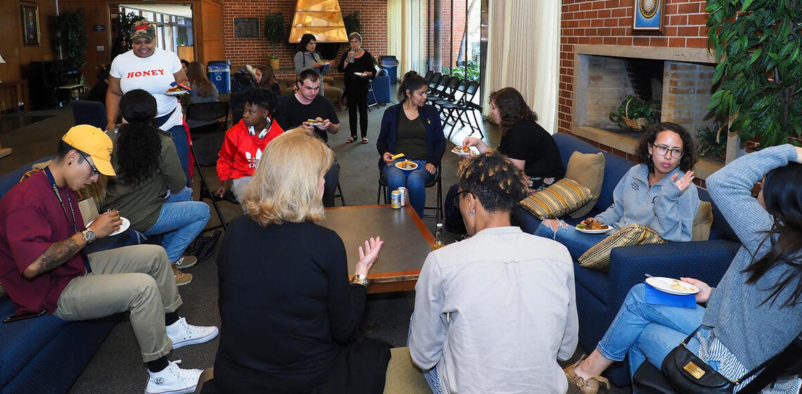 BHS student eating and speaking to each other