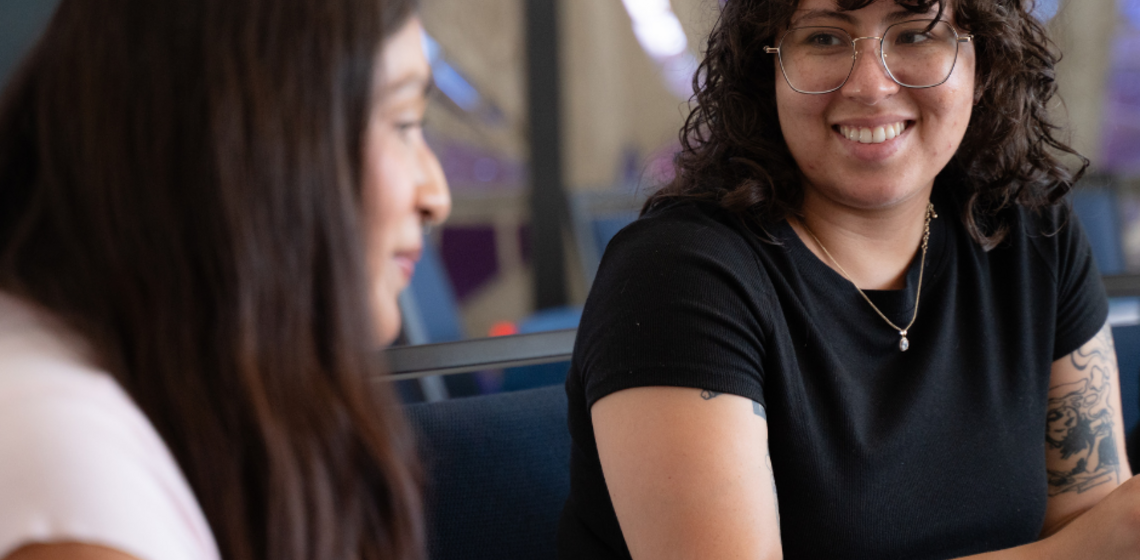 Photo of an advisor connecting with a scholar